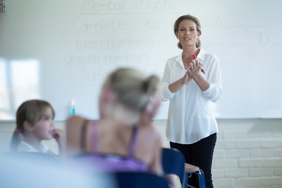 Teacher in a modern classroom setting